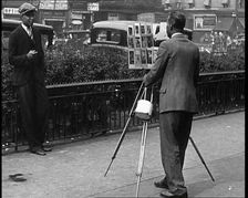 Photographer Taking a Picture of People On the Streets of New York City, 1932. Creator: British Pathe Ltd