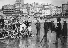 Photographer taking a seaside snap, c1900-1919(?). Creator: Unknown