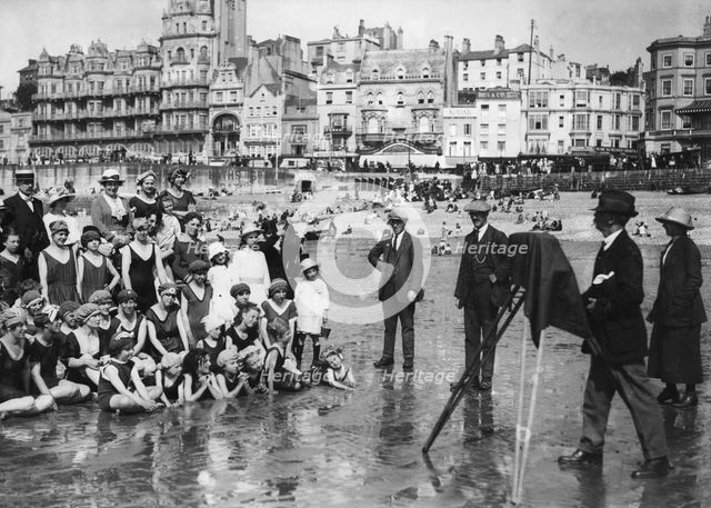 Photographer taking a seaside snap, c1900-1919(?). Creator: Unknown.