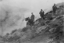 Photographers on hillside photographing Mt. Etna eruption, 1910. Creator: Bain News Service