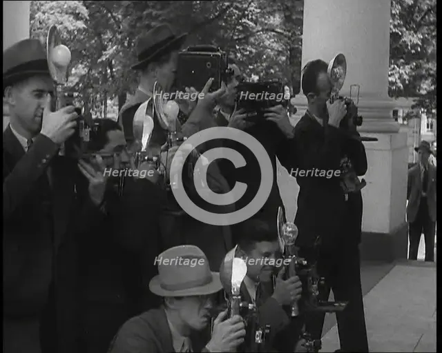 Photographers Photographing Henry Ford Arriving at the White House, 1930s. Creator: British Pathe Ltd.