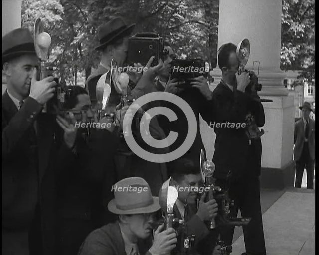 Photographers Photographing Henry Ford Arriving at the White House, 1930s. Creator: British Pathe Ltd.