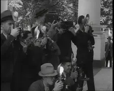 Photographers Photographing Henry Ford Arriving at the White House, 1930s. Creator: British Pathe Ltd
