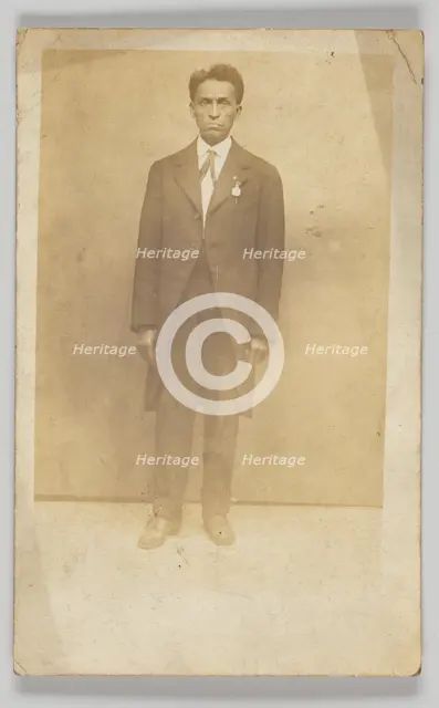 Photographic postcard of a man in a suit, 1904-1918. Creator: Unknown.