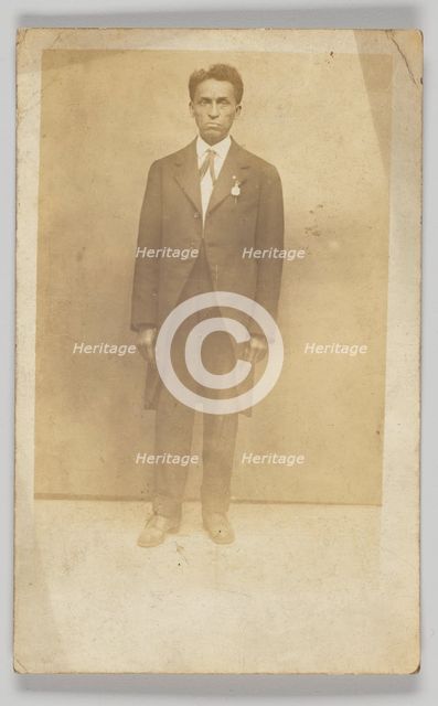 Photographic postcard of a man in a suit, 1904-1918. Creator: Unknown.