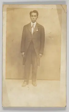 Photographic postcard of a man in a suit, 1904-1918. Creator: Unknown