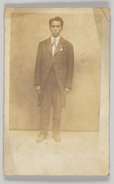 Photographic postcard of a man in a suit, 1904-1918. Creator: Unknown