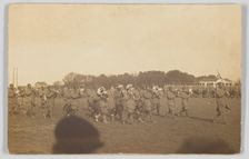 Photographic postcard of a military marching band, ca. 1917. Creator: Unknown