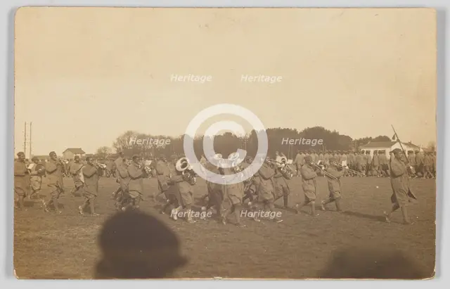 Photographic postcard of a military marching band, ca. 1917. Creator: Unknown.