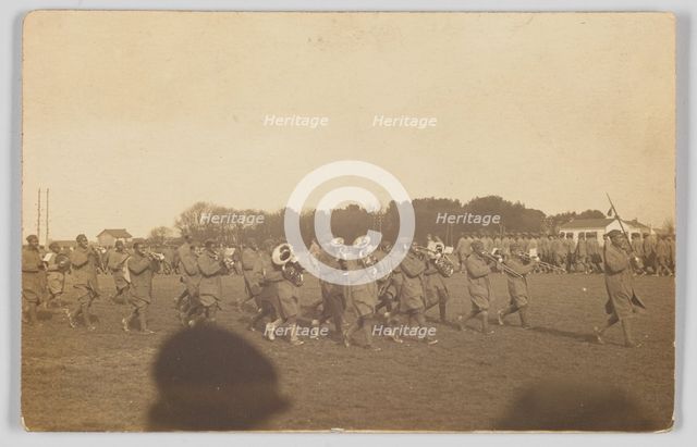 Photographic postcard of a military marching band, ca. 1917. Creator: Unknown.