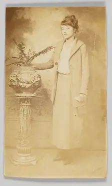 Photographic postcard of a woman, 1918-1930. Creator: The Rex Photo Studio