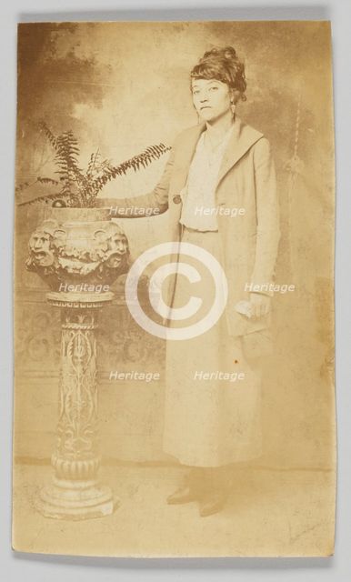 Photographic postcard of a woman, 1918-1930. Creator: The Rex Photo Studio.