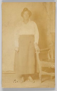 Photographic postcard of a woman, 1918-1930. Creator: Unknown