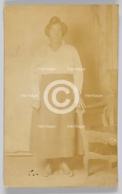 Photographic postcard of a woman, 1918-1930. Creator: Unknown.