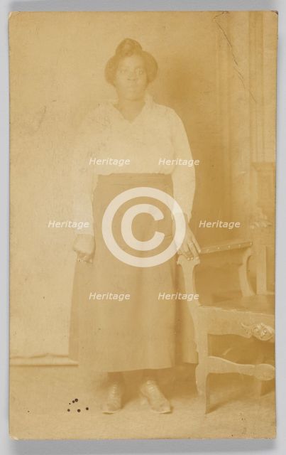 Photographic postcard of a woman, 1918-1930. Creator: Unknown.