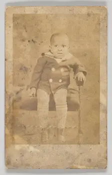 Photographic postcard of an unidentified young boy, 1926-1940s. Creator: Unknown