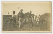 Photographic postcard of Charles Wilbur Rogan with his unit in the Philippines, 1910-1919. Creator: Unknown