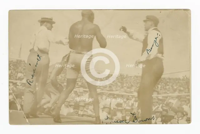 Photographic postcard of James J. Jeffries staggering away from Jack Johnson, 1910. Creator: Unknown.