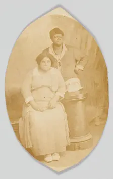 Photographic postcard of two unidentified women, 1918-1930. Creator: Unknown
