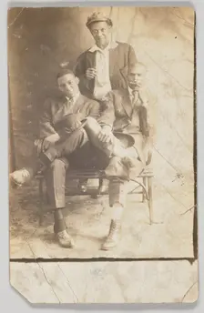 Photographic postcard of three unidentified men, 1904-1918. Creator: Unknown