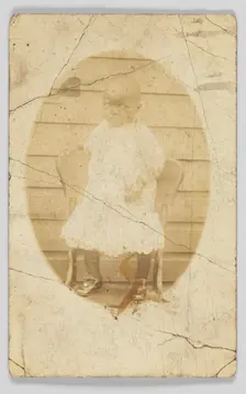 Photographic postcard of unidentified child, 1904-1918. Creator: Unknown