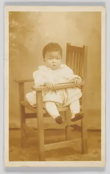 Photographic postcard of unidentified child, 1917-1930. Creator: Unknown