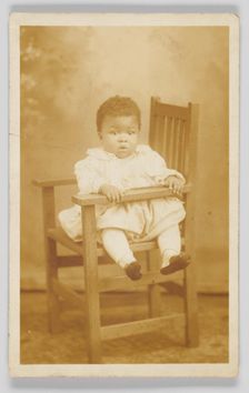 Photographic postcard of unidentified child, 1917-1930. Creator: Unknown