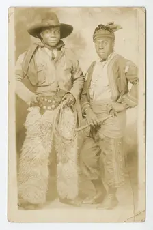 Photographic postcard portrait of two men in Western attire, early 20th century. Creator: Unknown