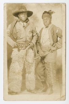 Photographic postcard portrait of two men in Western attire, early 20th century. Creator: Unknown