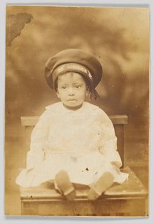 Photographic postcard with image of a small child, 1918-1930. Creator: Unknown