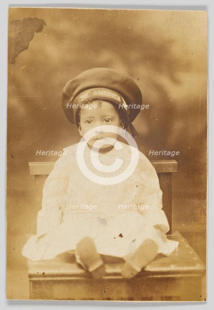 Photographic postcard with image of a small child, 1918-1930. Creator: Unknown.