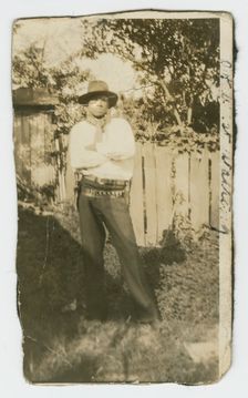 Photographic portrait of a man wearing hat and gun holster, early 20th century. Creator: Unknown