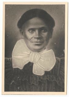 Photographic print of a woman with a large bow at her neck, ca. 1900. Creator: Unknown