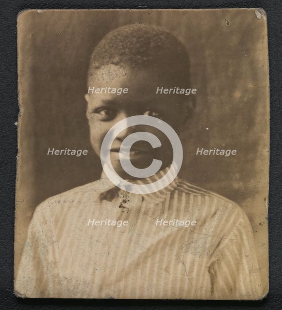 Photographic print of a young boy, early 20th century. Creator: Unknown.