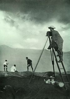 Photographing at the Crater's Lip, Aso-San 1910. Creator: Unknown