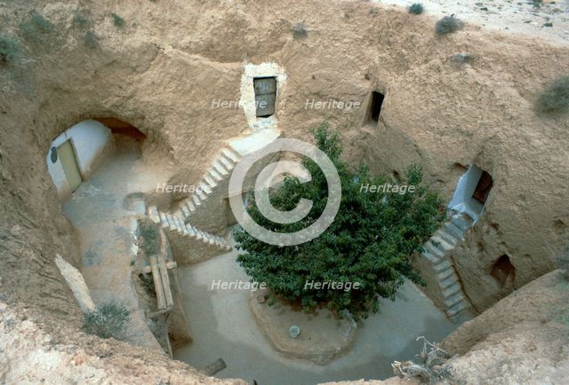 Pit-dwelling in Tunisia. Artist: Unknown