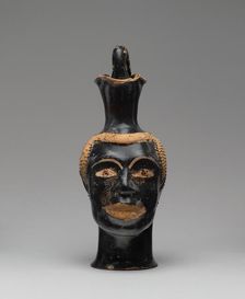 Pitcher (Oinochoe) in the Form of a Head of a Youth, about 510 BC. Creator: Class of Louvre H 62