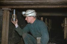 Pity Deputy tests for gas using Davy Safety Lamp