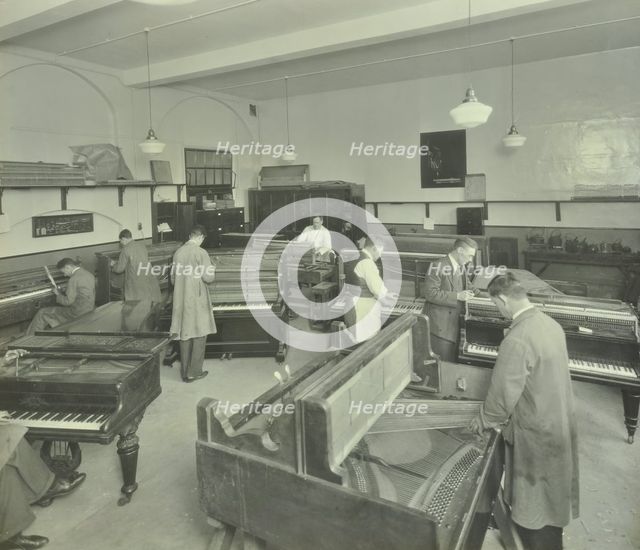 Piano repairing class, Northern Polytechnic, London, 1930.  Artist: Unknown.