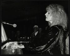 Pianist and singer Ellyn Rucker performing at The Fairway, Welwyn Garden City, Hertfordshire, 1992. Artist: Denis Williams