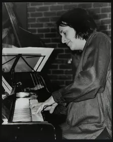 Pianist Kate Williams playing at The Fairway, Welwyn Garden City, Hertfordshire, 20 April 2003. Creator: Denis Williams