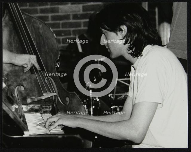 Pianist Leon Greening playing at The Fairway, Welwyn Garden City, Hertfordshire, 8 June 2003. Artist: Denis Williams