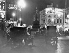 Piccadilly Circus at night, Westminster, London. Creator: Unknown