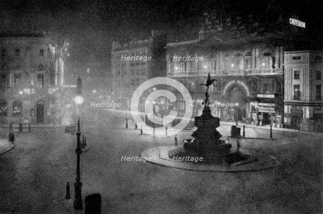 Piccadilly Circus, London, at night, 1908-1909.Artist: Charles F Borup