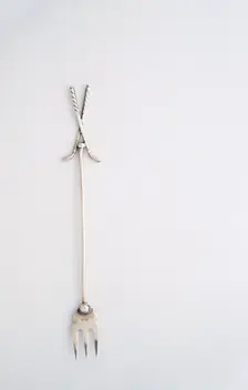 Pickle fork with a golfing theme, British, 1922. Creator: Unknown