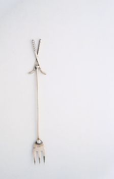 Pickle fork with a golfing theme, British, 1922. Creator: Unknown