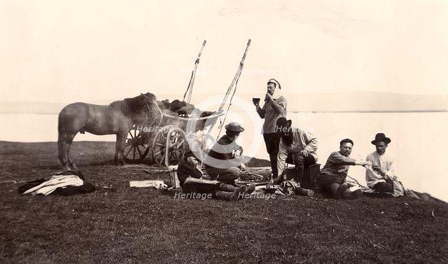 Picnic. Group of Men on the River Shore, 1900. Creators: I. A. Podgorbunskii, V. I. Podgorbunskii.