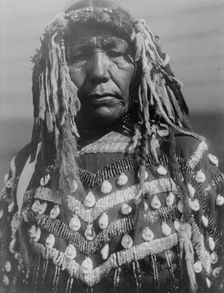 Piegan woman, c1910. Creator: Edward Sheriff Curtis