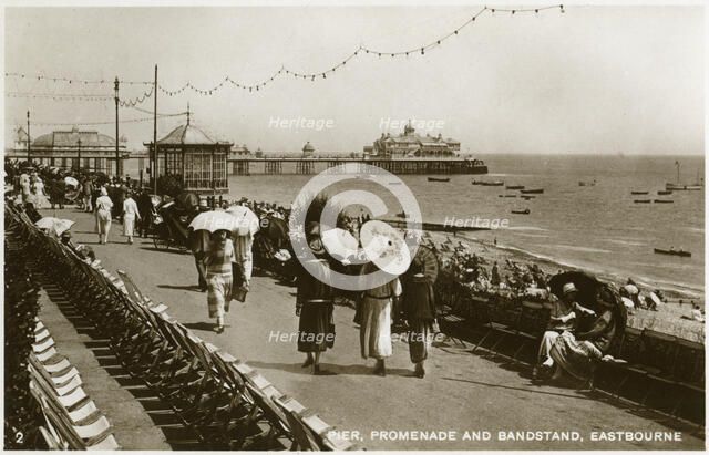 Pier, promenade and bandstand, Eastbourne, Sussex, c1920s(?). Artist: Unknown
