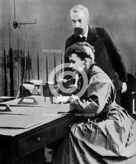 Pierre and Marie Curie in their laboratory, 1898 (1951). Artist: Unknown